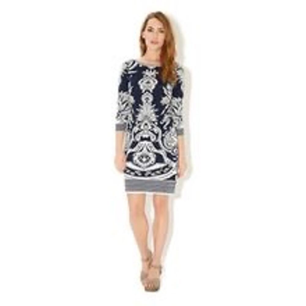 navy blue and white patterned dress by the brand Haani.